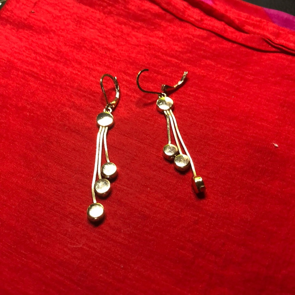 Gold tone long earrings